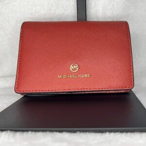 Michael Kors Jet Set Charm Medium Slim Wallet in the color Terracotta Like New